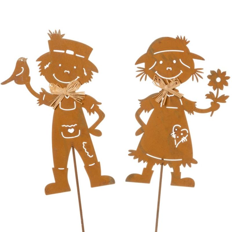 Epouvantail métal rouille sur pic